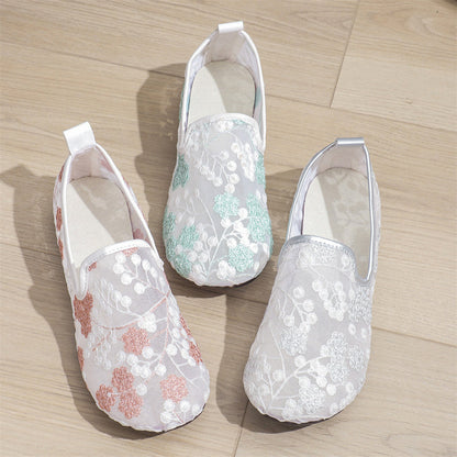 Chaussures plates brodées de dentelle